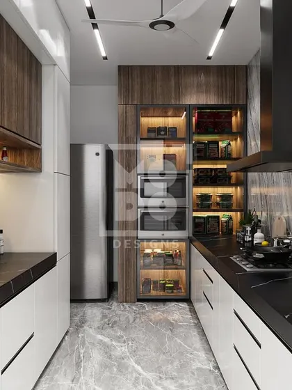 A look inside a highly functional galley kitchen. We maximized storage with floor-to-ceiling cabinets and ensured a seamless workflow with integrated appliances and well-lit countertops.