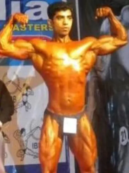 Another look at my 60kg shredded physique from my early competition days. This is where it all began.