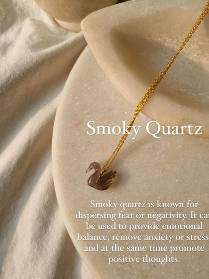 The Smoky Quartz swan pendant is a reminder to move with grace while the stone works to promote positive thoughts and remove anxiety.