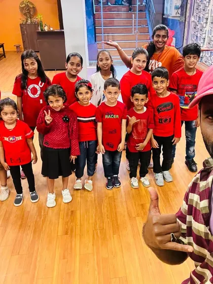 A group selfie with my awesome crew of young dancers. Capturing the fun we have together after a great practice session.
