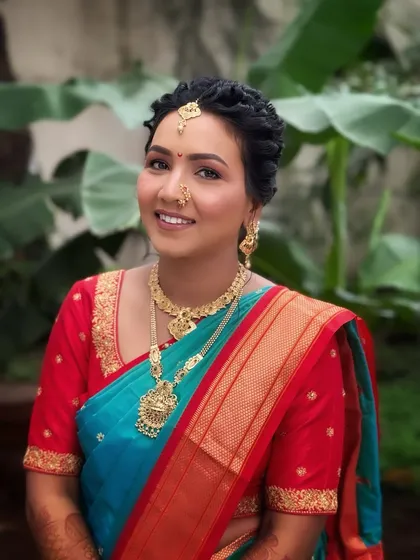 A stunning Maharashtrian bride glowing in her traditional Navvari look. I specialize in creating authentic and elegant cultural bridal styles, complete with intricate hairstyling and jewelry placement.