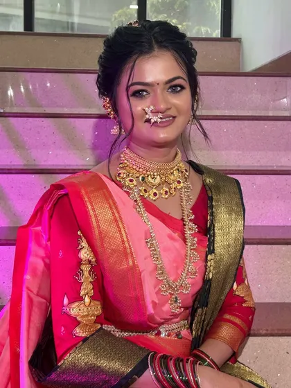 A happy and bright portrait of the bride, her smile lighting up her entire look.