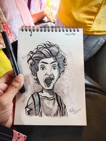 The expressive caricature shown in context, drawn on the go.