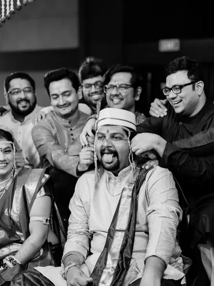 A classic group photo with the groom and his friends, but with a twist. Pushkar's signature funny face makes this a memorable and fun shot.