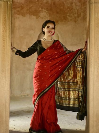 This look is from the archives but remains timeless. A classic red saree paired with elegant makeup is a combination that will always be in style for a reception or traditional event.