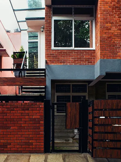 This facade illustrates Proportion. The size and placement of the gate, the brick wall, and the upper floor are carefully balanced to create a cohesive and visually pleasing composition.