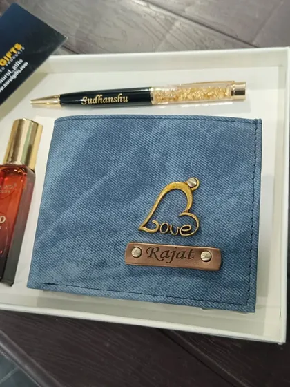 You can also choose a different fragrance for the gift set. This one features a personalized denim wallet and pen with Bella Vita's OUD perfume.