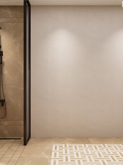 This minimalist bathroom design focuses on clean lines and subtle textures. The floor features an intricate mosaic tile rug pattern, adding a decorative element without overwhelming the serene, marble-effect porcelain tile surroundings.