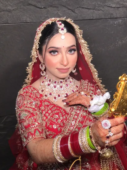 A portrait of my beautiful bride, showcasing her intricate jewelry and flawless makeup.
