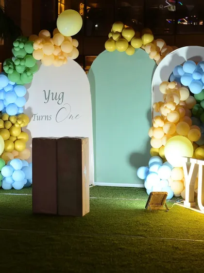 A close-up of the arched backdrops for the baby elephant theme.