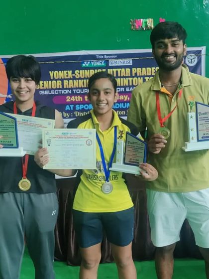 **A Trio of Senior Champions.** Our athletes proudly display their gold and silver medals from the UP Senior Ranking Tournament, showcasing their successful transition to the senior category.