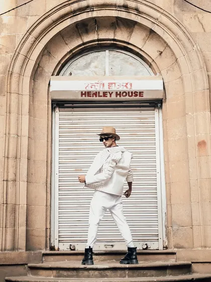 A dynamic pose that captures the energy of the performance-themed shoot.