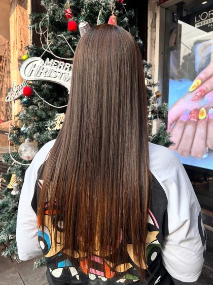 Here is the final look from the back after a Hair Botox session. The hair is not just straight but also looks deeply conditioned and healthy, with a noticeable gloss.