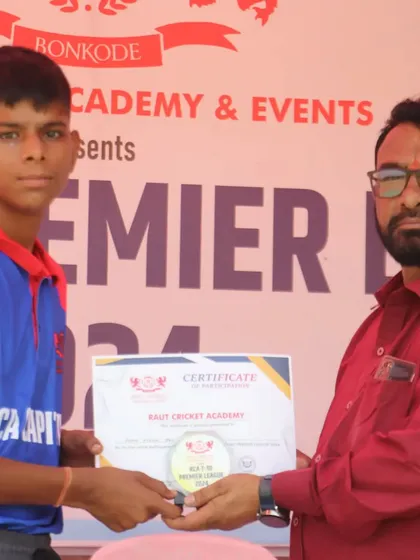 Presenting a certificate to a young player from the RCA Capitals. We encourage and acknowledge every participant.