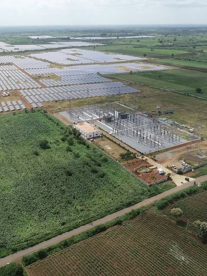 An aerial view showing the integration of our new 50.7 MWp solar project with the existing infrastructure at Gadag, Karnataka. This strategic expansion showcases our ability to scale operations efficiently while leveraging established grid connections.