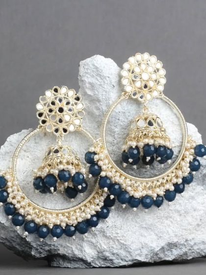The same beautiful mirror work chandbali hoops, this time in a deep navy blue. A perfect choice for an evening event.