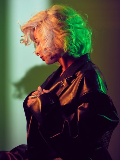 A profile shot using green and yellow light, creating a dynamic and futuristic feel. This was part of a shoot for my new music.