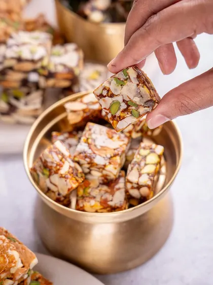 Some bites don’t need an introduction. This dry fruit and nut barfi is made with just nuts, jaggery, and the kind of satisfying crunch that feels like winter. It's slow-made, rich in goodness, and pure comfort.