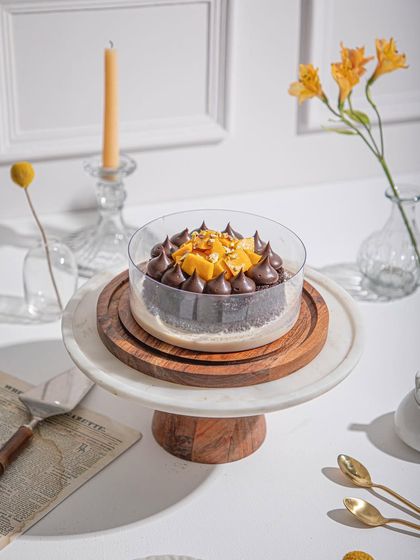 The Tres Leches you've been dreaming of, with a summer twist. Our light sponge cake is soaked in three milks and topped with chocolate cream and fresh mango.