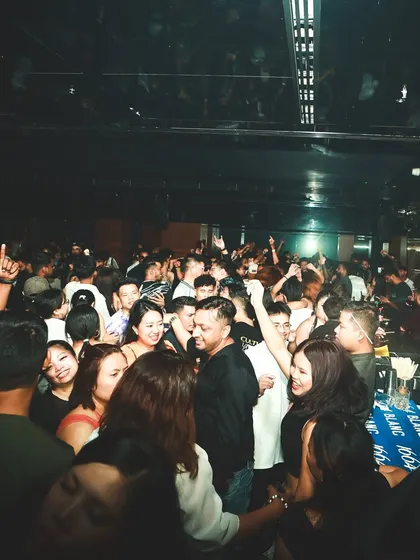 A wide shot of a full house. No matter the venue, I know how to read the room and play the tracks that get people moving.