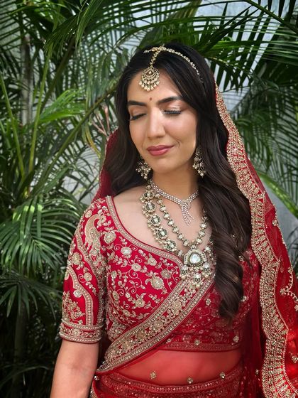 An eyes-closed shot to showcase the soft, blended eyeshadow and perfectly defined brows.