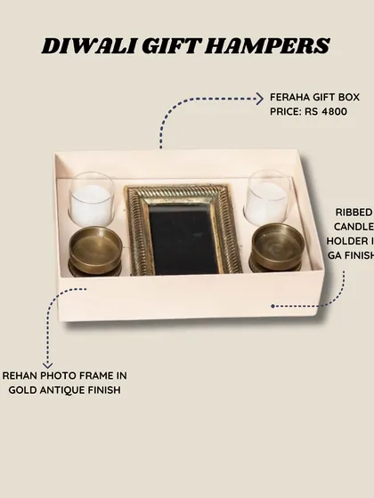 This is my Feraha gift box, a curated hamper featuring a gold antique finish photo frame and two ribbed candle holders. It's a complete, ready-to-gift set that feels both personal and luxurious.