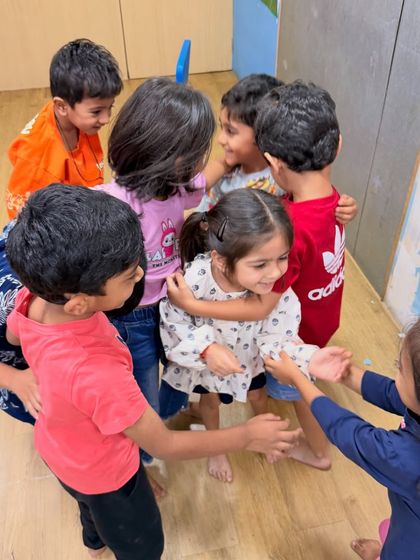 Group hugs are a regular occurrence here. We foster a sense of community and emotional expression in all our activities.