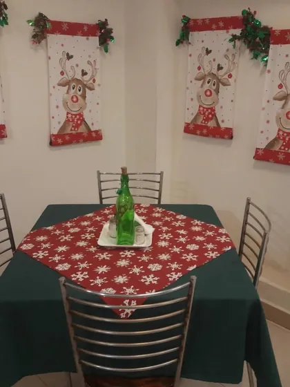 An intimate table for four, perfect for a quiet Christmas meal with loved ones.