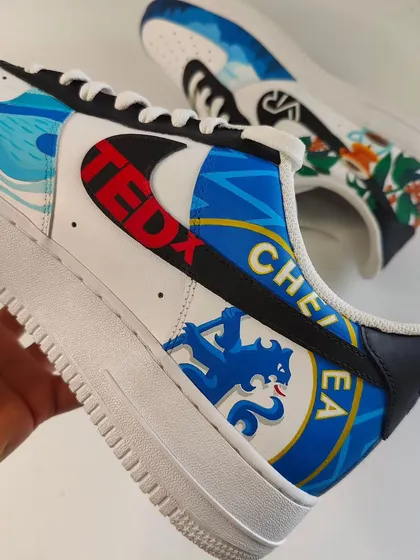 This pair was a mashup of all the client's favourite things, including his love for Chelsea FC. I painted the club's shield right over the Nike swoosh.