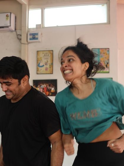 The actors of "Gretel" share a laugh during rehearsals.