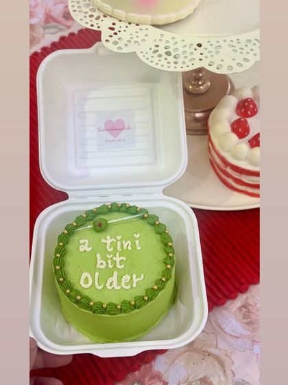 A fun martini-themed bento cake for a birthday celebration. The olive green color and witty message make this a sophisticated and playful choice.