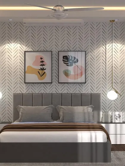 This is a design render for a master bedroom at Piramal Vaikunth, Thane, showcasing a calm and sophisticated retreat. The design features a textured herringbone accent wall, a plush grey upholstered bed, and delicate pendant lights that provide warm, ambient lighting.