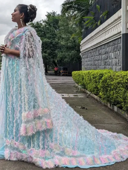 This magical unicorn jacket gown is available as a mother-daughter combo. The iridescent, feathery fabric creates a truly unique and whimsical look.