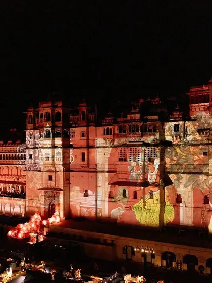 Another stunning projection design, this time featuring traditional Indian art motifs in a warm, red-toned palette.