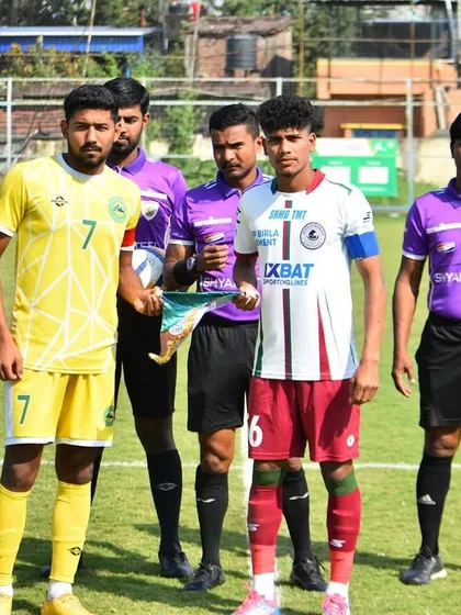 A pre-match lineup featuring our player as captain in the Reliance Development League, competing against top clubs like Mohun Bagan.