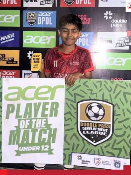 Chaitanya Madhukar proudly displays his Player of the Match award after a strong performance for the U-12 team.