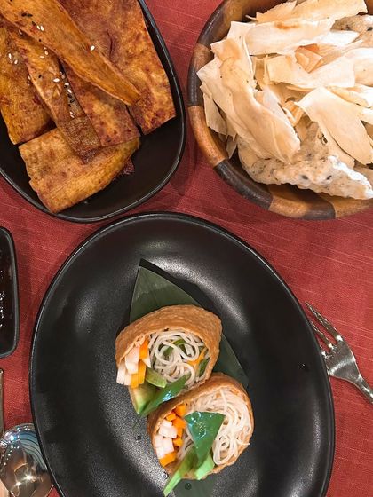 An appetizer spread at The Spice Route, including tofu rolls and cassava chips. I like to show the variety of starters to give a full picture of the menu's offerings.