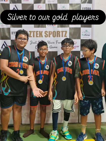 Our young players proudly wearing their silver medals. For us, they are gold, showing incredible grit and determination in every game.