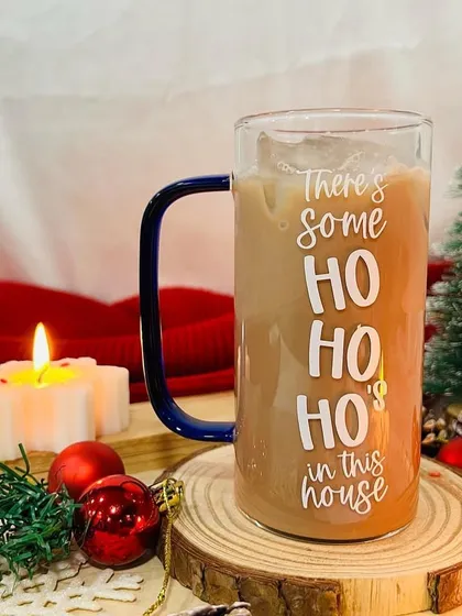 'There's some Ho Ho Ho's in this house'. A fun and festive tall glass mug for your Christmas beverages.