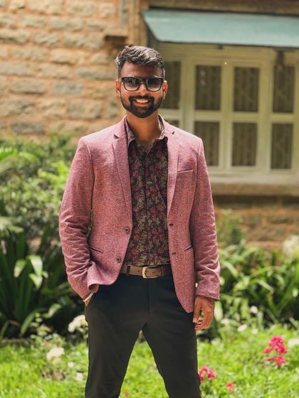 A smiling, confident pose. I bring not just music but also a positive and professional presence to your event.