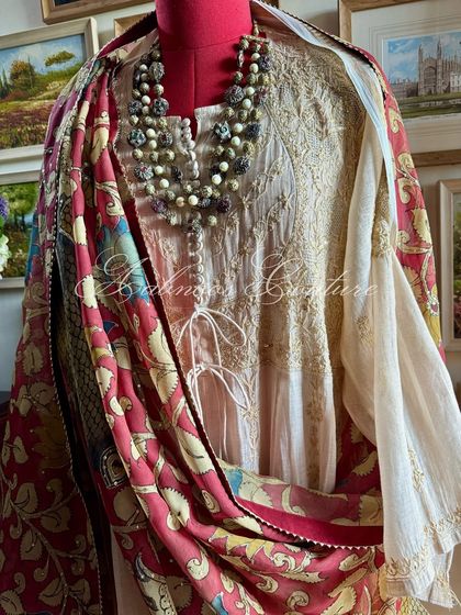 A slightly different angle of the full ensemble, providing another perspective on this luxurious outfit.