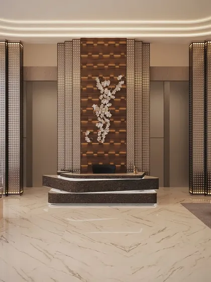 For this commercial lobby concept, we blended contemporary textures with warm, ambient lighting. The design features a sculptural reception desk and intricate wall panels to create an entrance that is both welcoming and impressively grand.