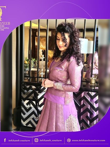 Steal the show at your next event with this stunning lavender designer outfit. The jacket and skirt set is perfect for a wedding, gala, or any special occasion.