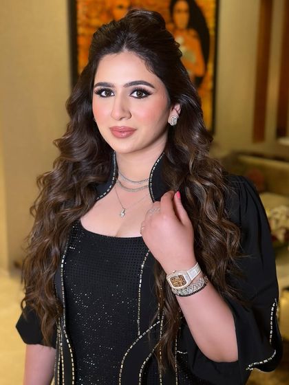 Another angle of this beautiful look, showing off the flawless skin and the soft, blended eye makeup.