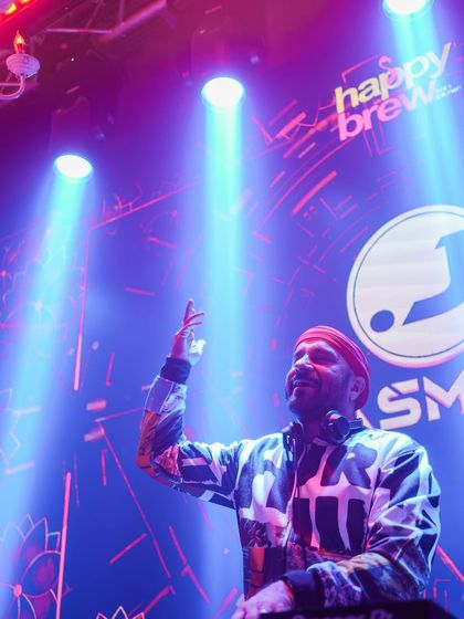 Feeling the music under the spotlights at a 'Mondaze' event.