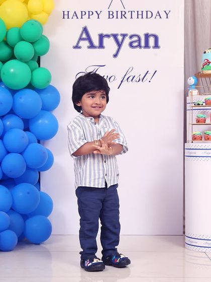 A magical 'Unicorn' themed birthday party, with pastel colors, shimmering backdrops, and unicorn illustrations, creating a whimsical and dreamy atmosphere.