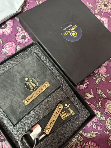 A customer's photo of their new denim wallet and keychain set, personalized with the name 'Special'.