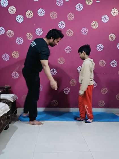 Teaching the importance of posture and alignment, which is the foundation of both yoga and strength training.