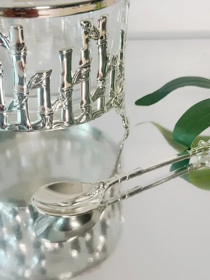 A close-up on the delicate, bamboo-detailed spoon that accompanies the sugar pot. It is the small, thoughtful details that make a piece truly special.
