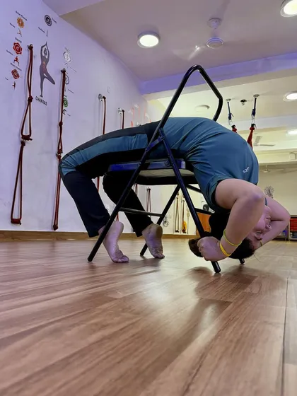 The chair as a tool for a deep, restorative backbend. This feels amazing after a long day.